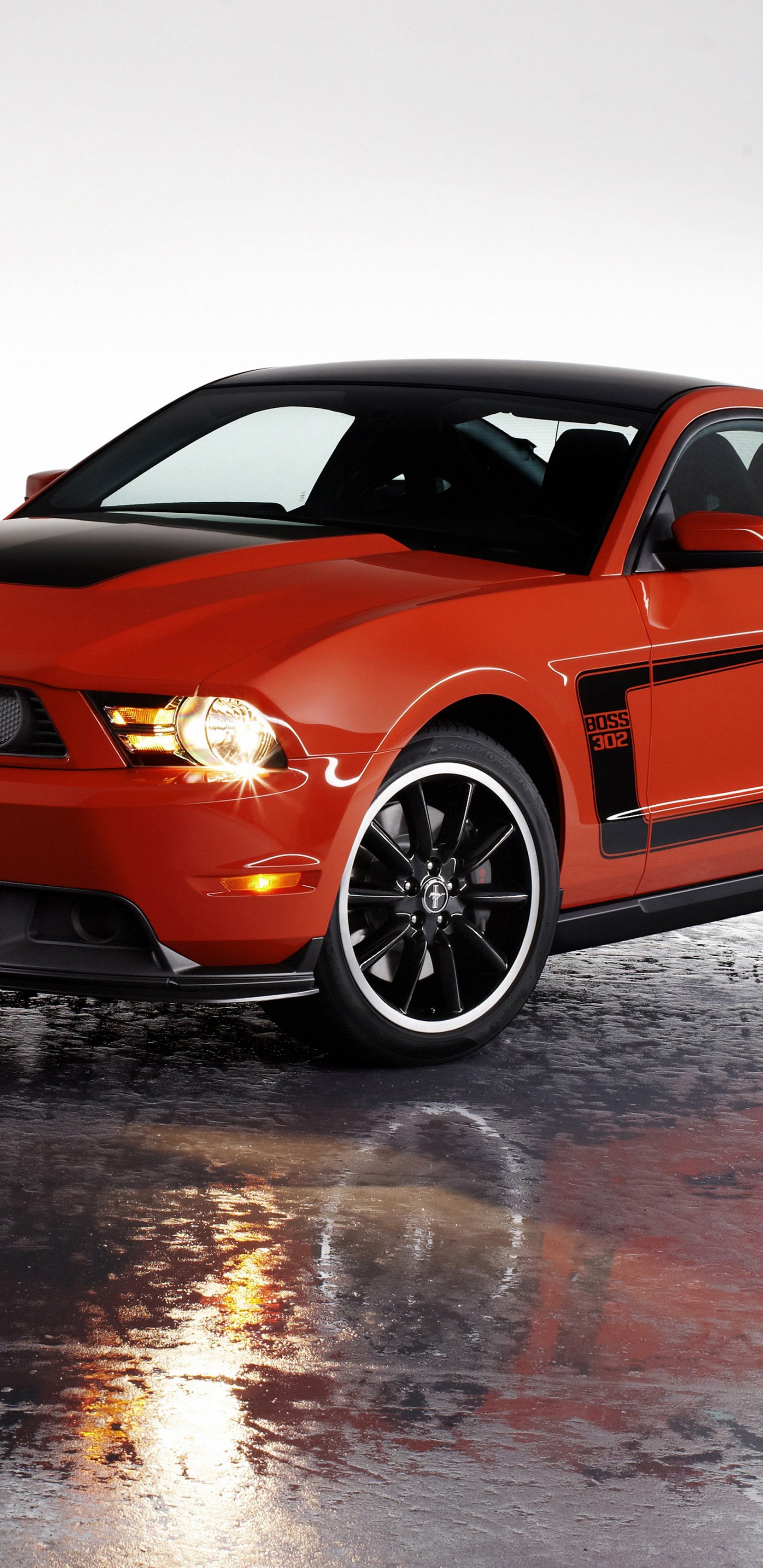 Naranja Bmw m 3 Coupe Sobre Suelo Cubierto de Nieve. Wallpaper in 1440x2960 Resolution