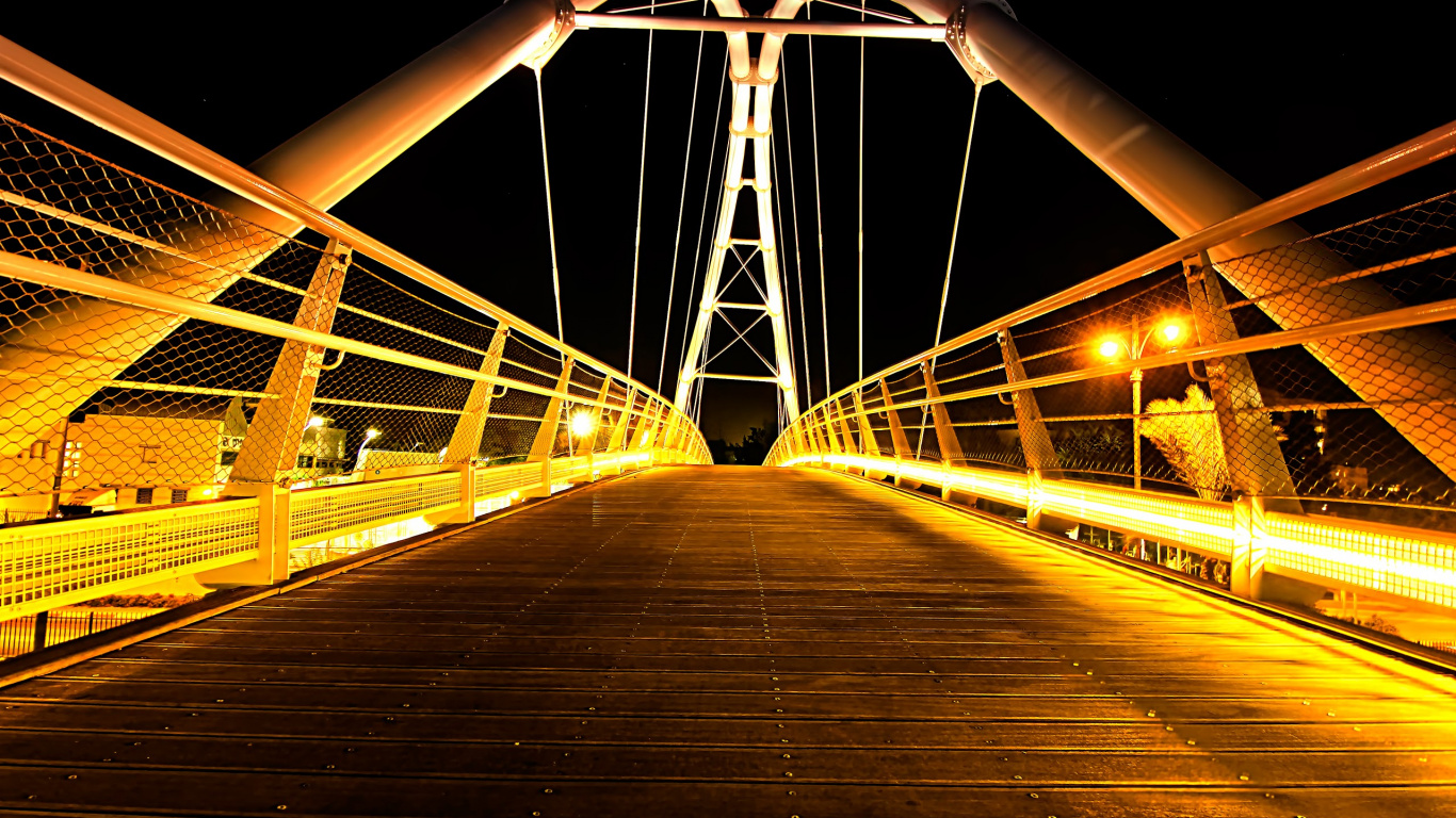 Brown Wooden Bridge With Light Post During Night Time. Wallpaper in 1366x768 Resolution