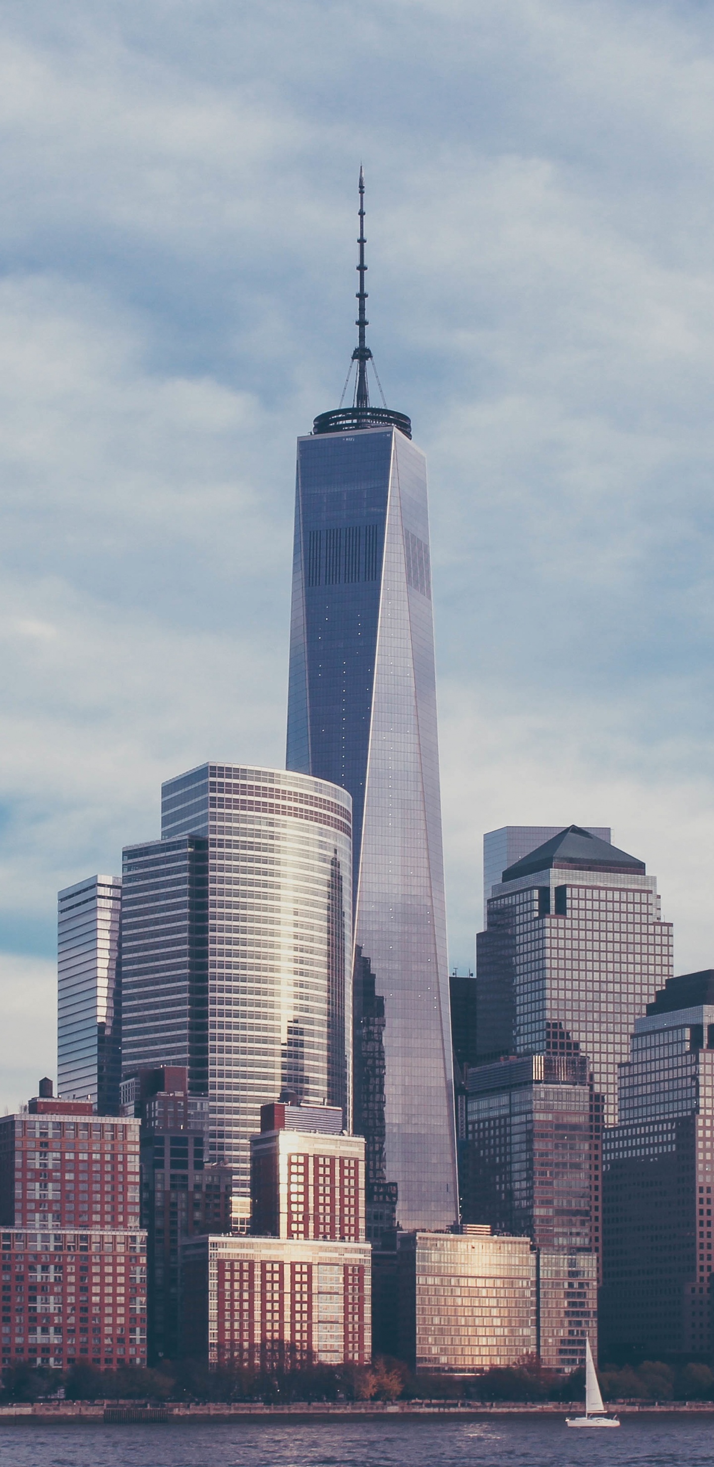 City Skyline Under White Clouds During Daytime. Wallpaper in 1440x2960 Resolution