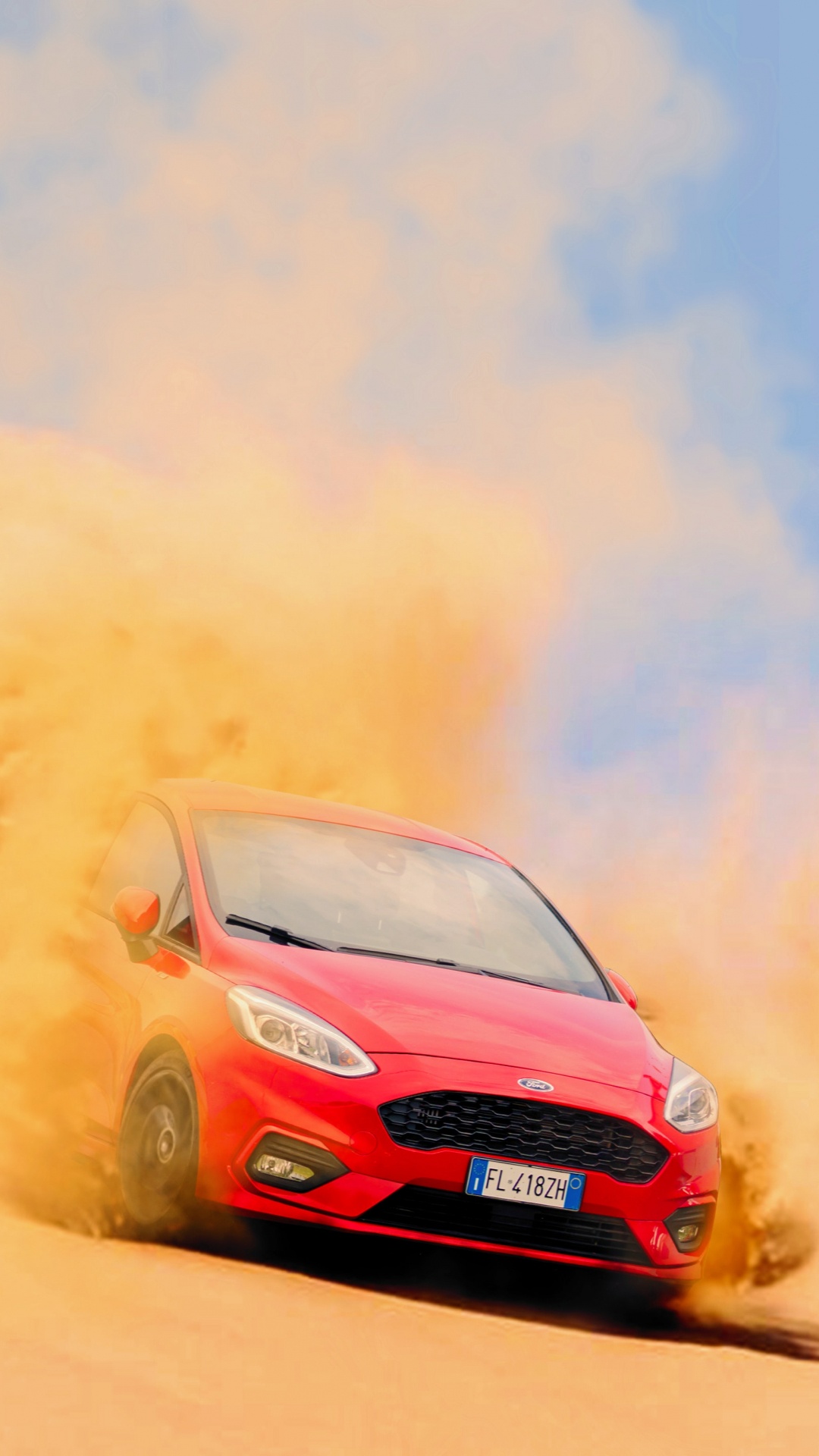 Voiture Rouge Sur le Sable Brun Sous Les Nuages Blancs et le Ciel Bleu Pendant la Journée. Wallpaper in 1080x1920 Resolution