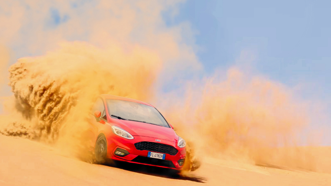 Voiture Rouge Sur le Sable Brun Sous Les Nuages Blancs et le Ciel Bleu Pendant la Journée. Wallpaper in 1366x768 Resolution