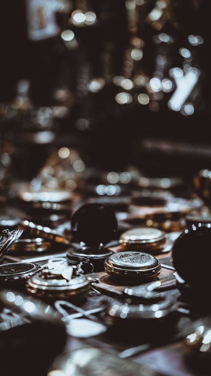 Silver Round Coins on Table. Wallpaper in 720x1280 Resolution