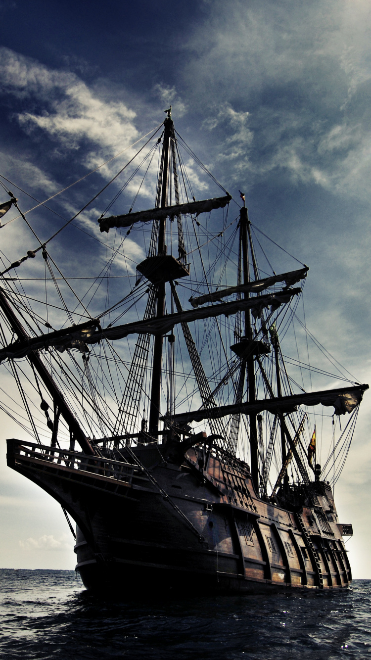 Brown Ship on Sea Under Blue Sky and White Clouds During Daytime. Wallpaper in 750x1334 Resolution