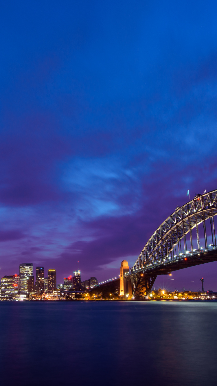 City Skyline Under Blue Sky During Night Time. Wallpaper in 750x1334 Resolution