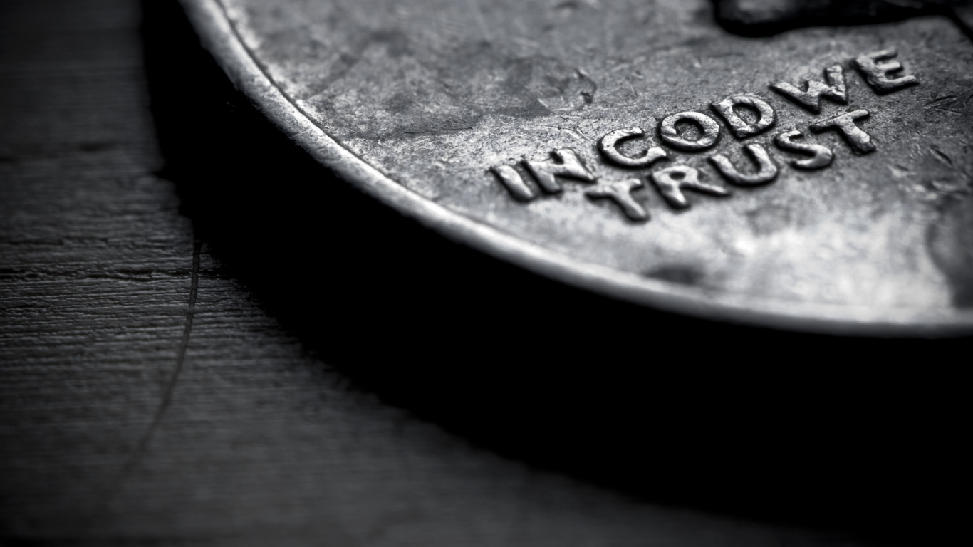 Silver Round Coin on Brown Textile. Wallpaper in 1366x768 Resolution