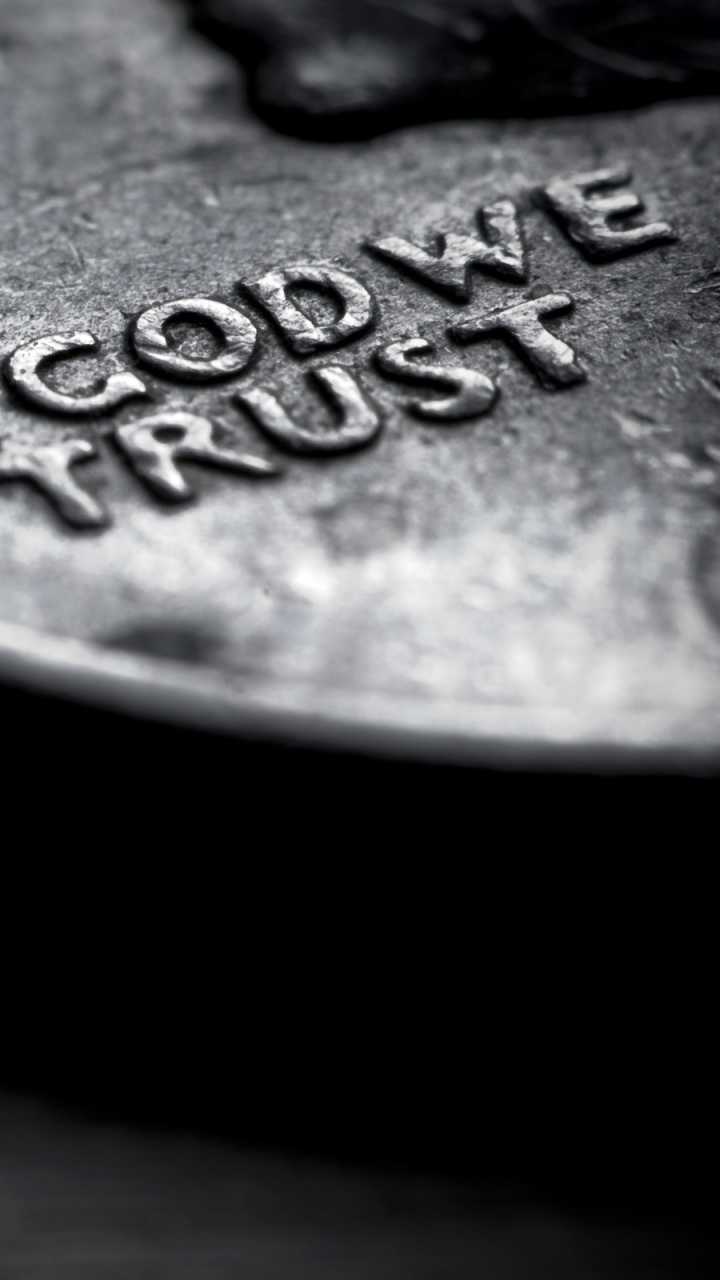 Silver Round Coin on Brown Textile. Wallpaper in 720x1280 Resolution