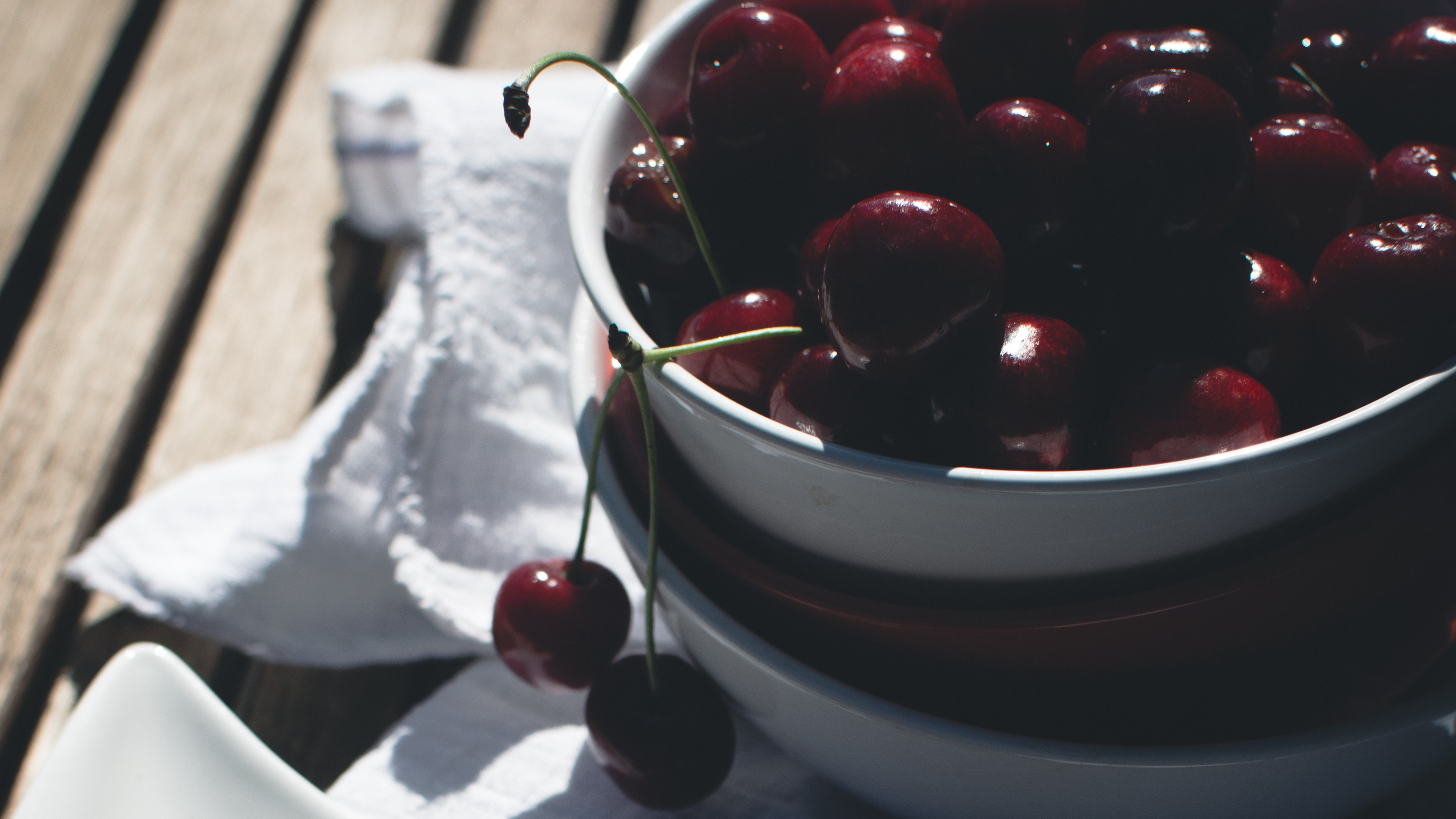 Red Cherries on White Ceramic Bowl. Wallpaper in 3840x2160 Resolution