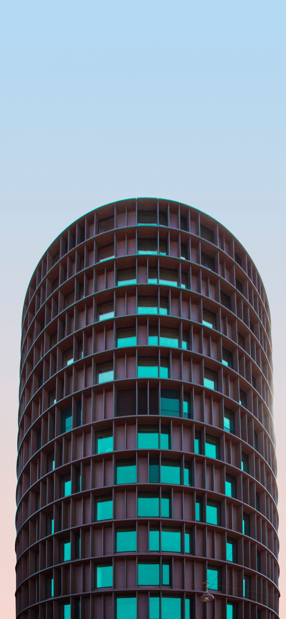 Edificio Redondo Gris y Negro. Wallpaper in 1125x2436 Resolution