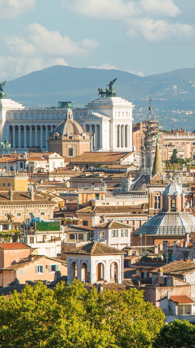 Weißes Und Braunes Betongebäude in Der Nähe Von Grünen Bäumen Tagsüber. Wallpaper in 750x1334 Resolution