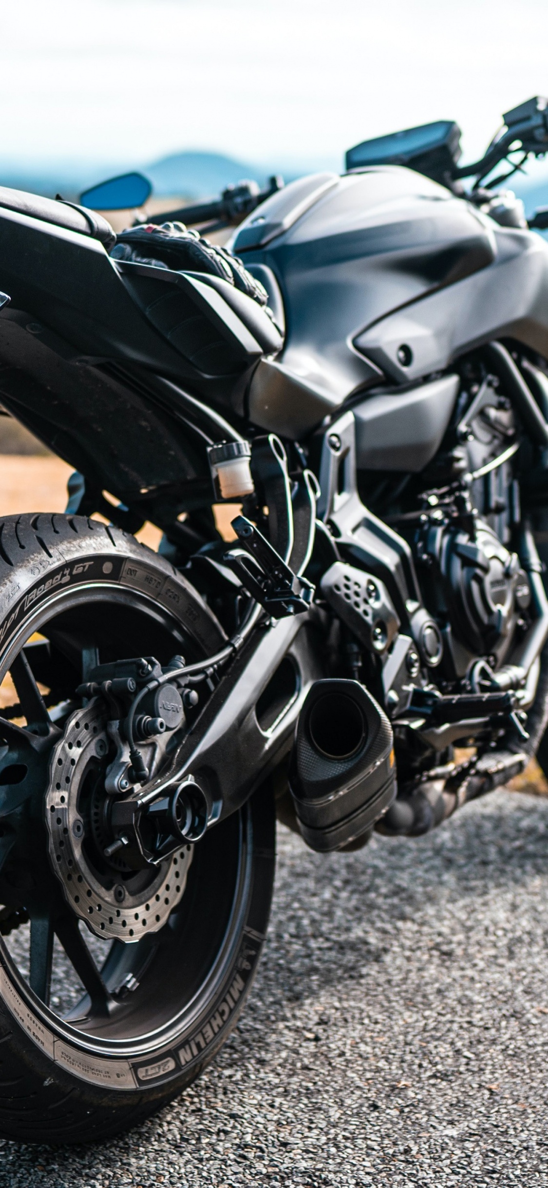 Motorcycle, Motorcycle Helmet, Cruiser, Wheel, Tire. Wallpaper in 1125x2436 Resolution