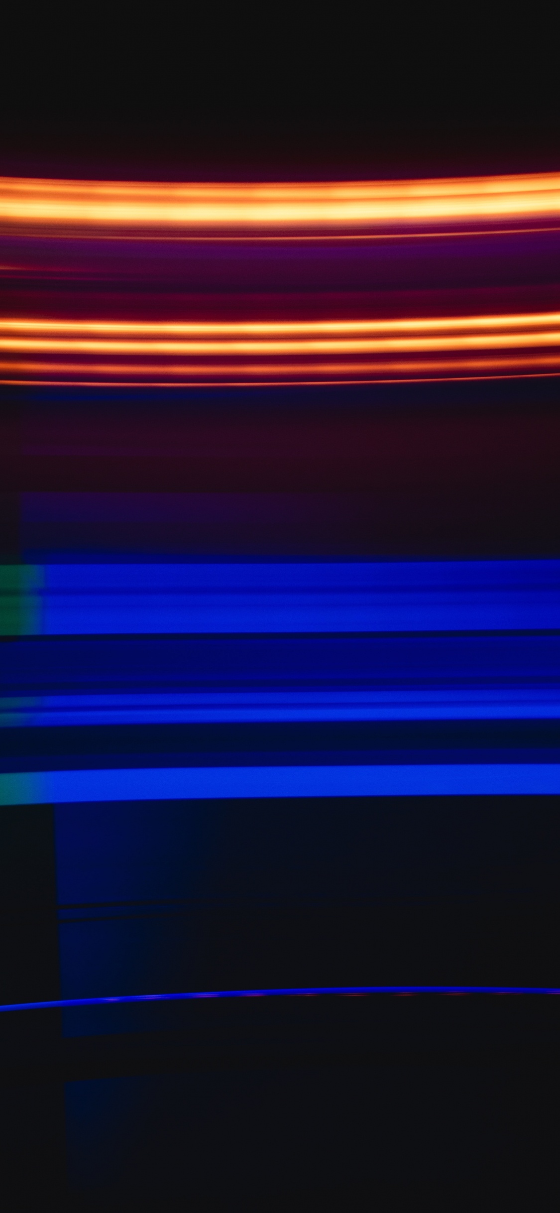 Blaue Rote Und Gelbe Lichter. Wallpaper in 1125x2436 Resolution