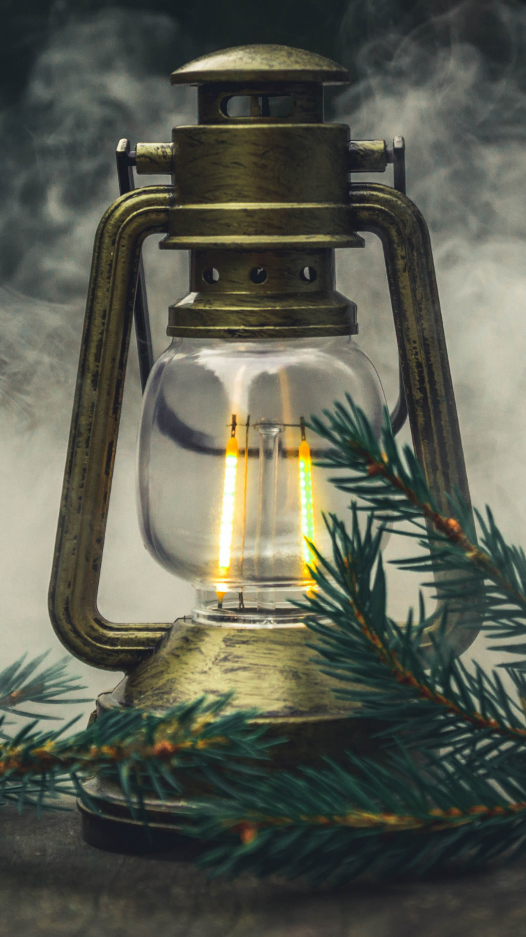 Clear Glass Bottle With Yellow Liquid. Wallpaper in 750x1334 Resolution