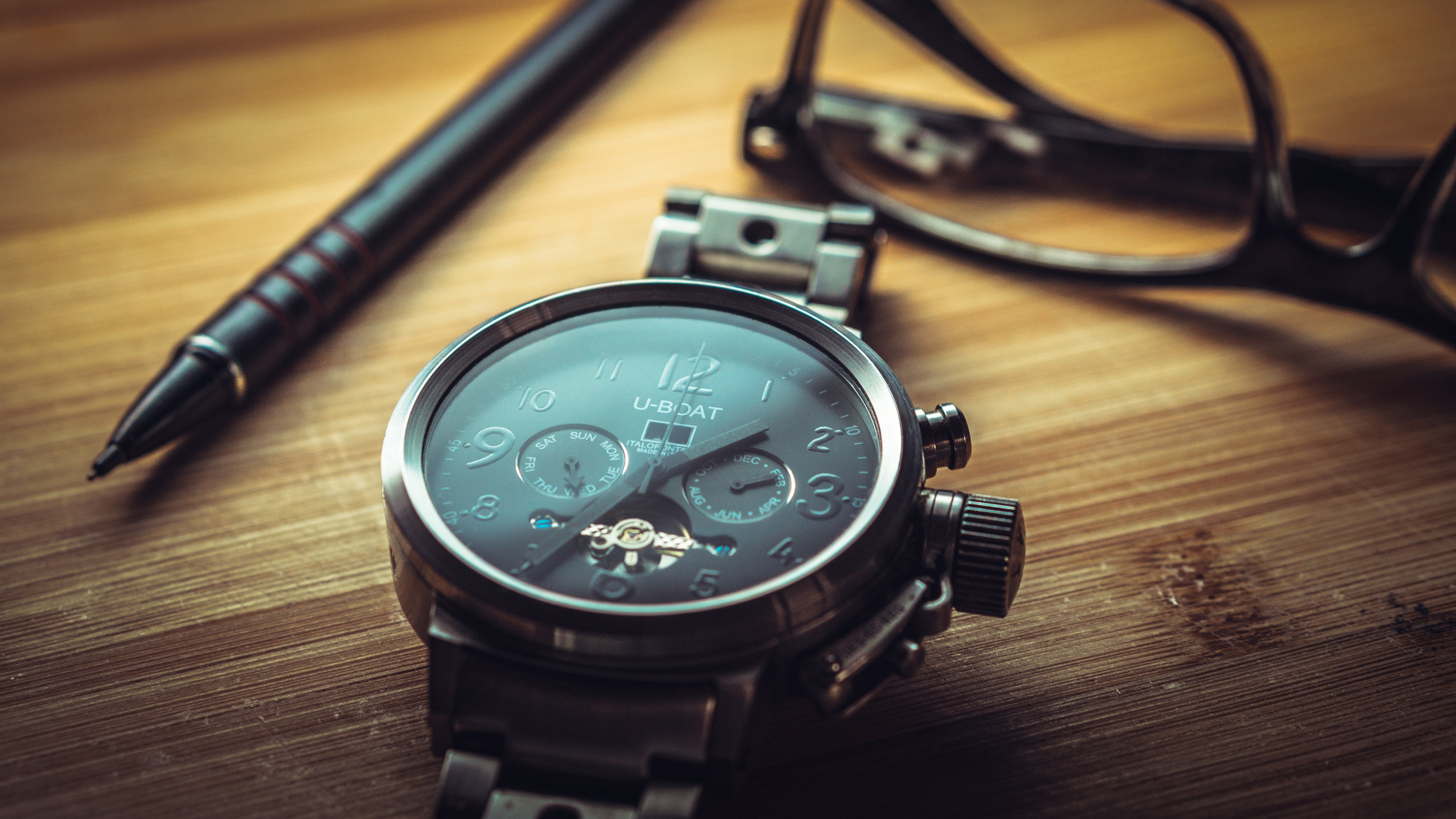 Black and Silver Chronograph Watch on Brown Wooden Table. Wallpaper in 2560x1440 Resolution
