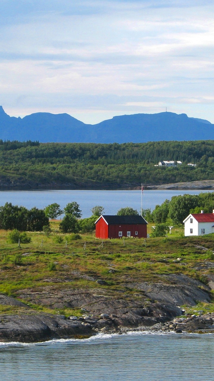 White and Red House Near Body of Water During Daytime. Wallpaper in 720x1280 Resolution