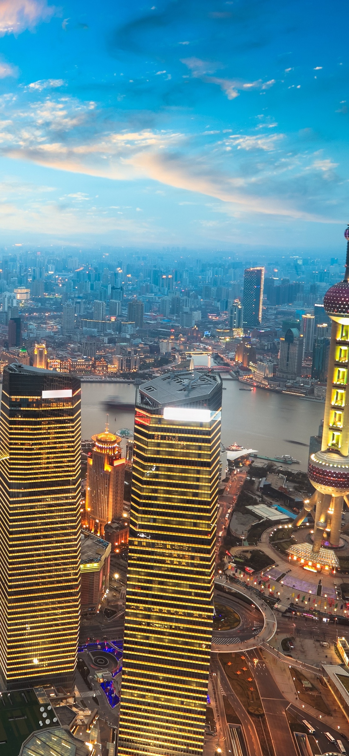 Aerial View of City Buildings During Daytime. Wallpaper in 1125x2436 Resolution