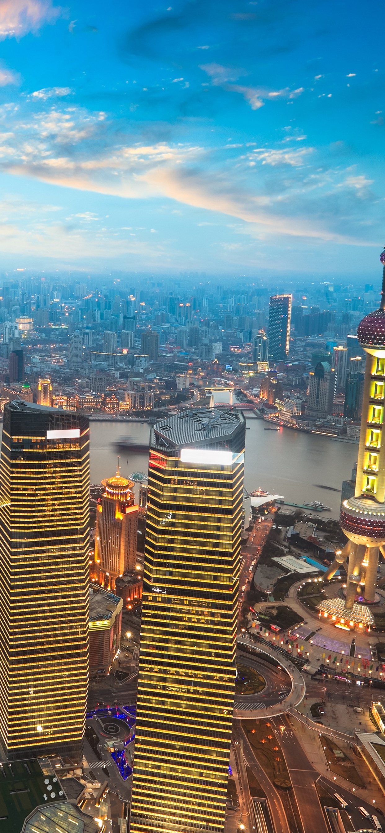 Aerial View of City Buildings During Daytime. Wallpaper in 1242x2688 Resolution