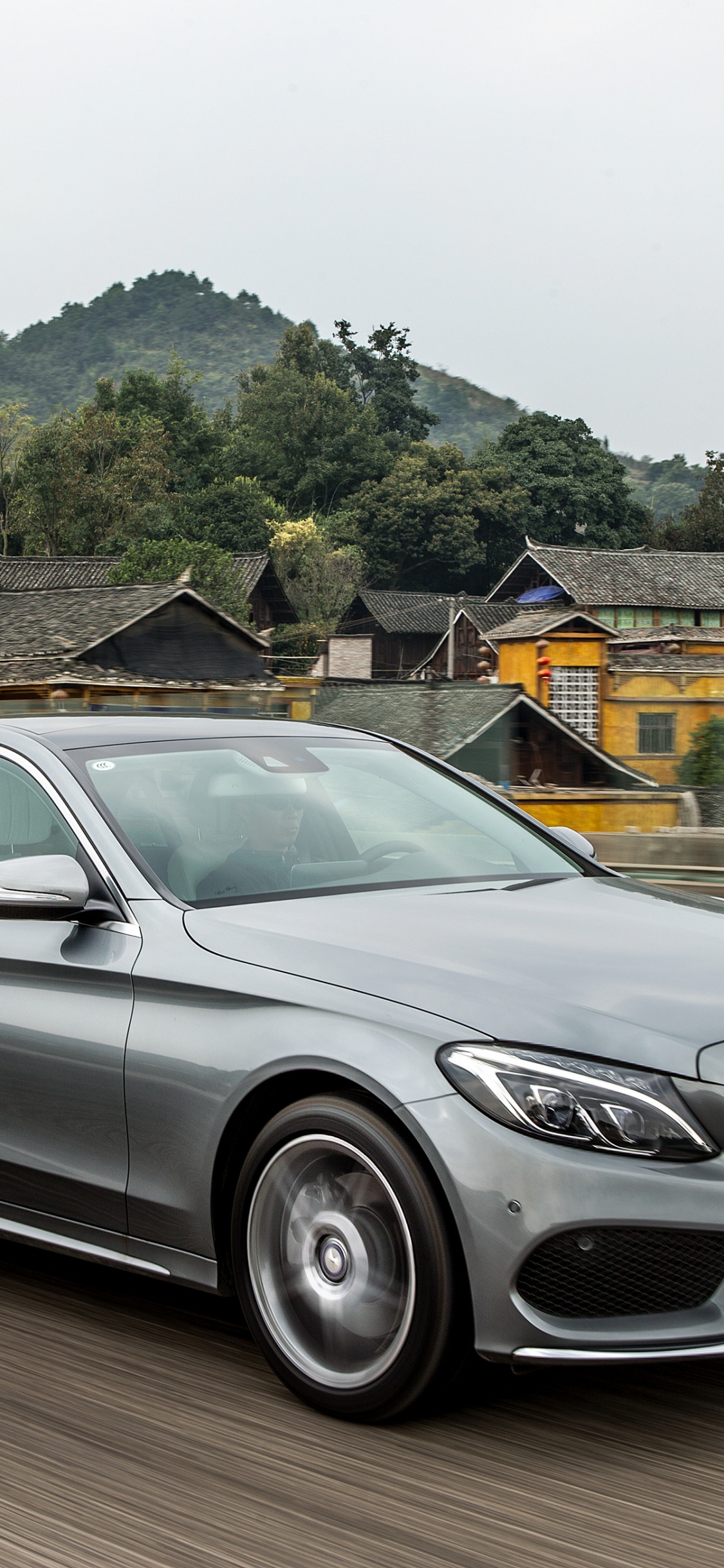 Silver Mercedes Benz Coupe on Road During Daytime. Wallpaper in 1125x2436 Resolution