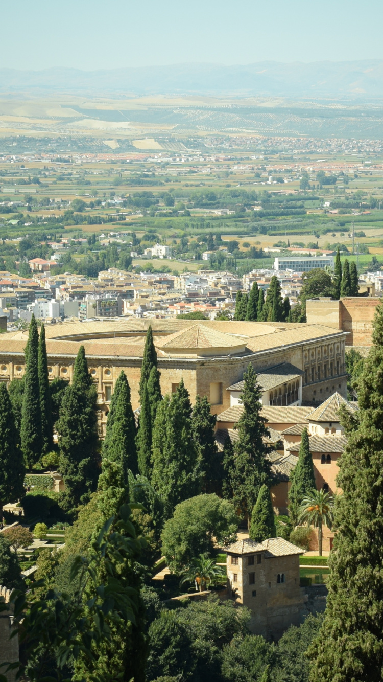 Vista Aérea de la Ciudad Durante el Día.. Wallpaper in 750x1334 Resolution