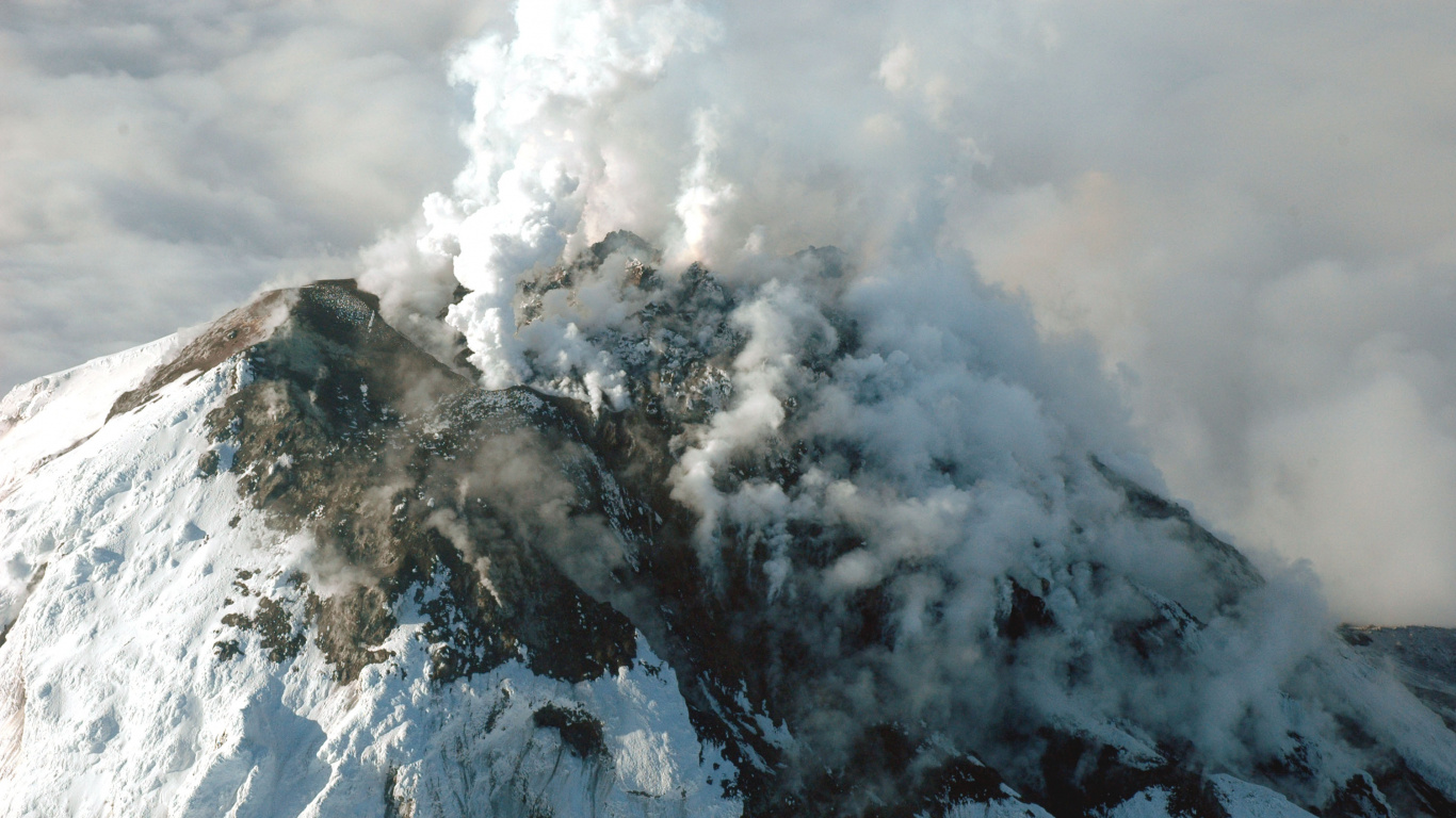 Snow Covered Mountain Under White Clouds During Daytime. Wallpaper in 1366x768 Resolution
