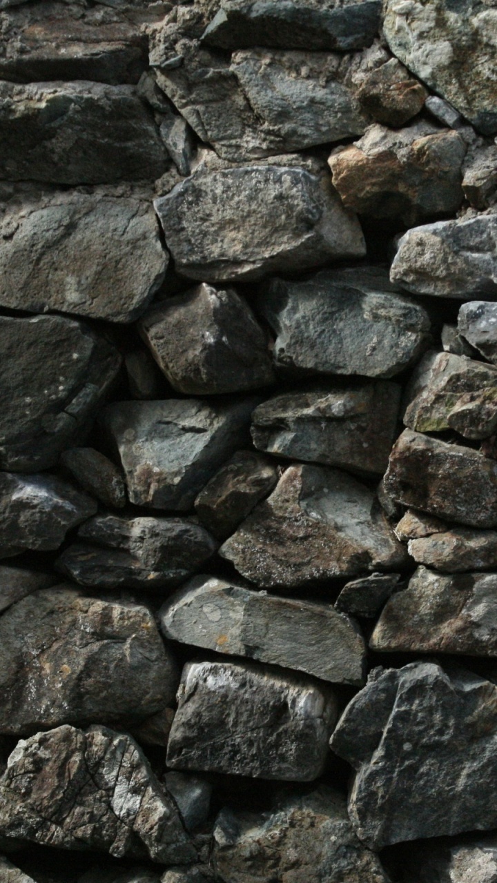 Braune Und Graue Steinmauer. Wallpaper in 720x1280 Resolution