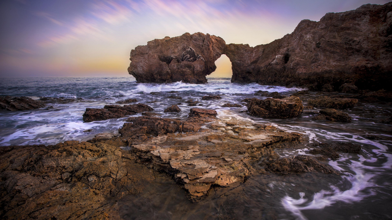 Brown Rock Formation on Sea During Daytime. Wallpaper in 1280x720 Resolution