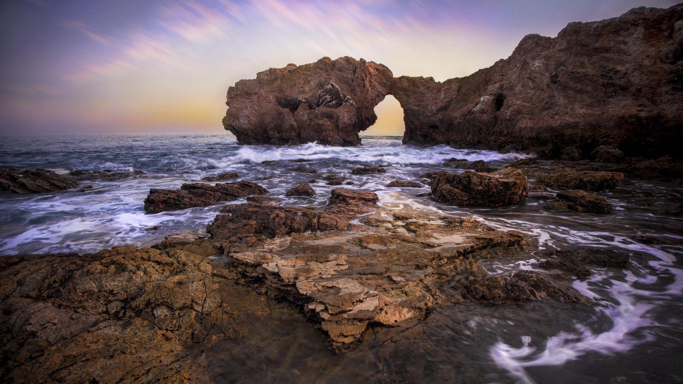 Brown Rock Formation on Sea During Daytime. Wallpaper in 1366x768 Resolution