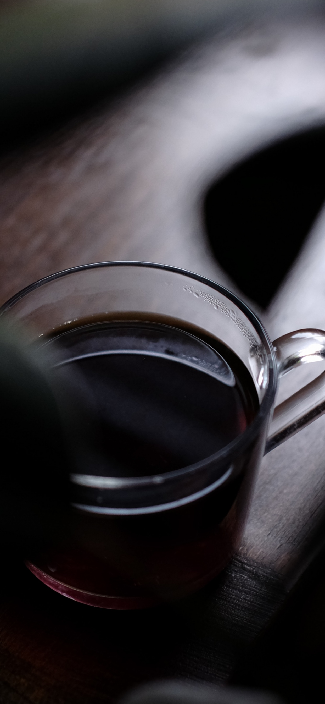 Clear Glass Mug With Brown Liquid Inside. Wallpaper in 1242x2688 Resolution