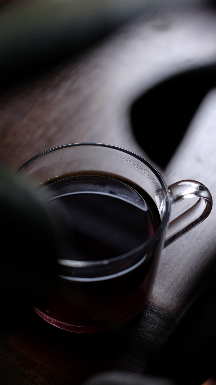 Clear Glass Mug With Brown Liquid Inside. Wallpaper in 750x1334 Resolution