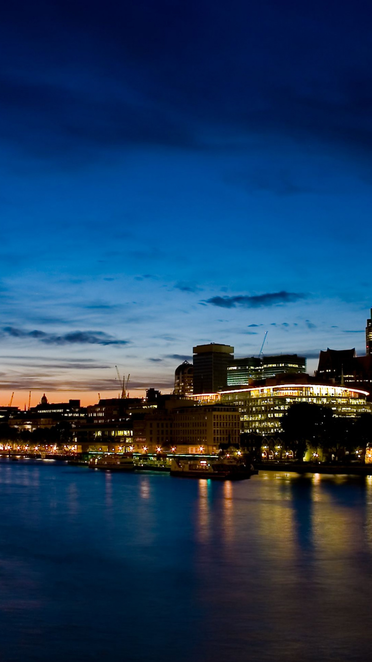 City Skyline During Night Time. Wallpaper in 750x1334 Resolution