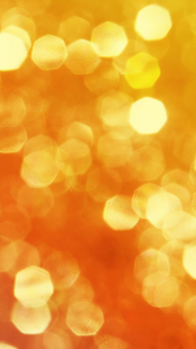 Orange and White Bokeh Lights. Wallpaper in 750x1334 Resolution