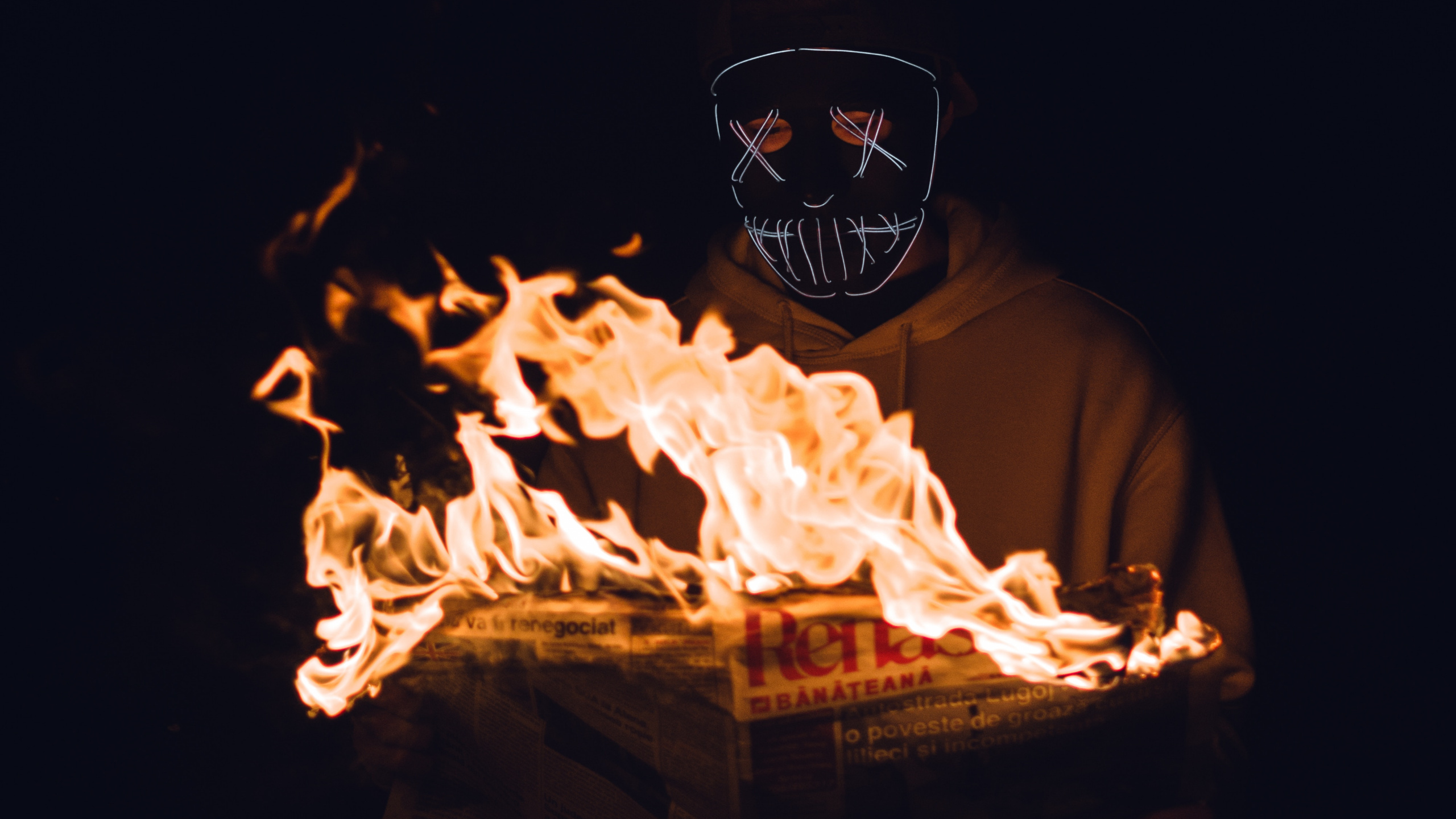 Man in Black Mask and White Shirt. Wallpaper in 2560x1440 Resolution