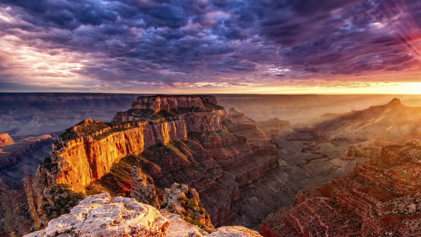 Brown Rocky Mountain Under Gray Clouds. Wallpaper in 1366x768 Resolution