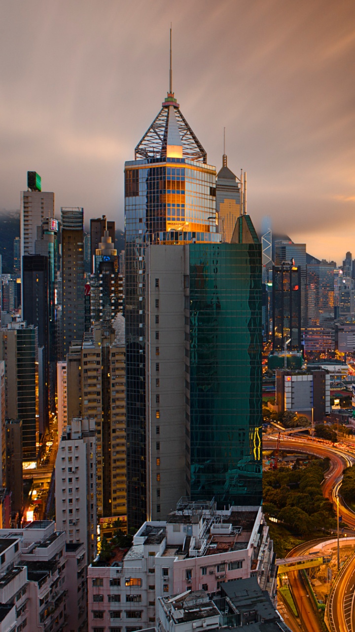 City Skyline During Golden Hour. Wallpaper in 720x1280 Resolution