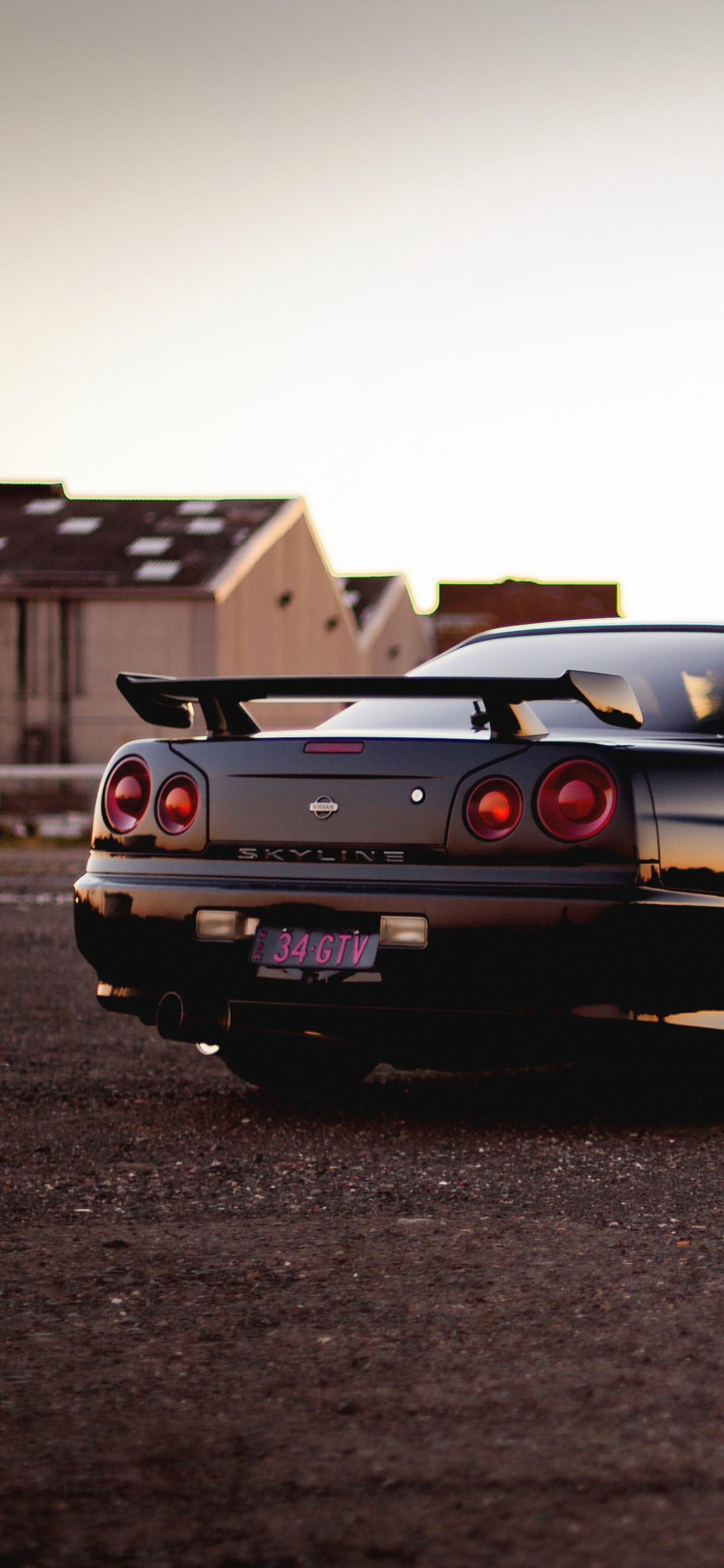 Black Coupe on Road During Daytime. Wallpaper in 1242x2688 Resolution