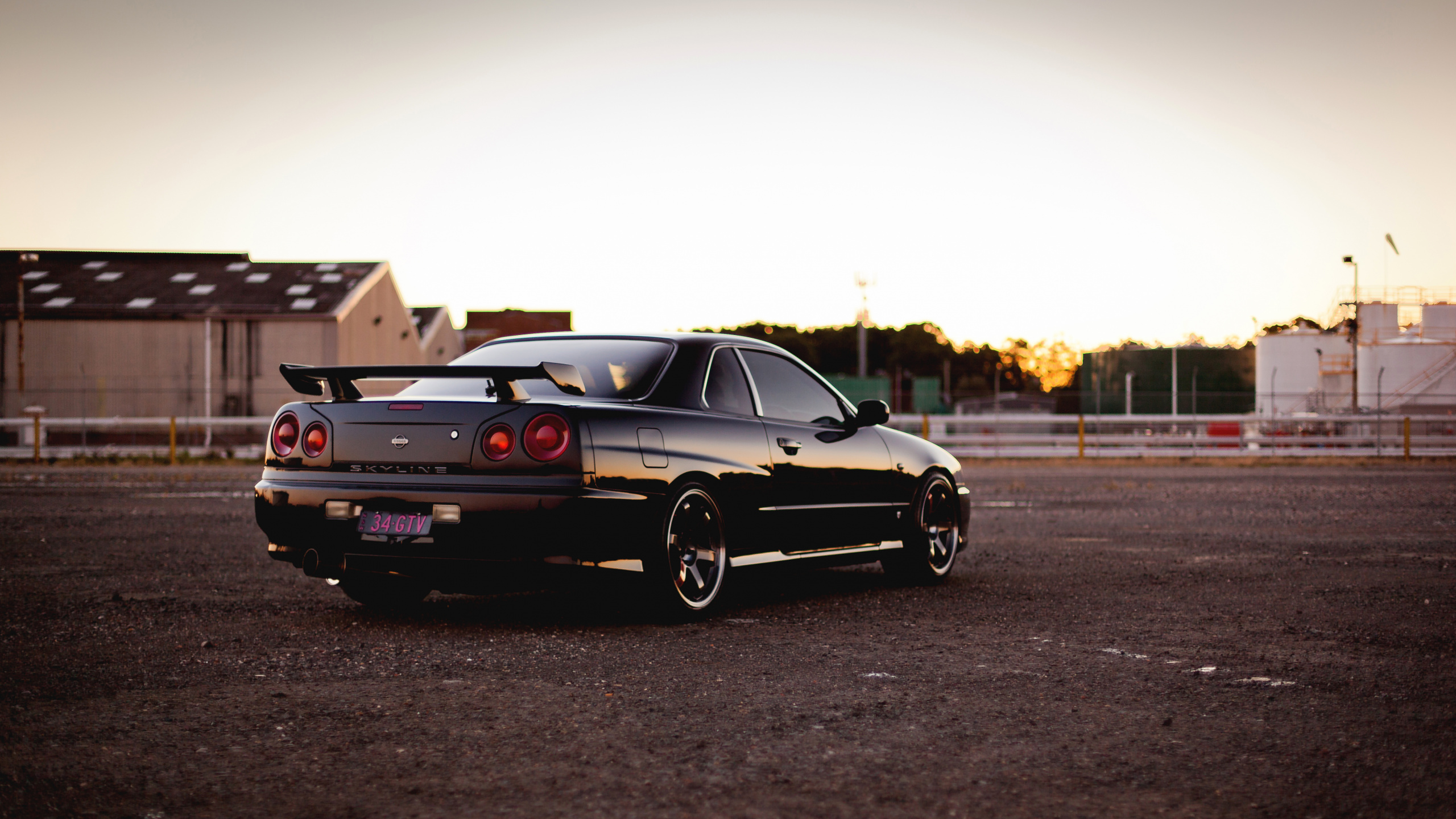 Black Coupe on Road During Daytime. Wallpaper in 2560x1440 Resolution
