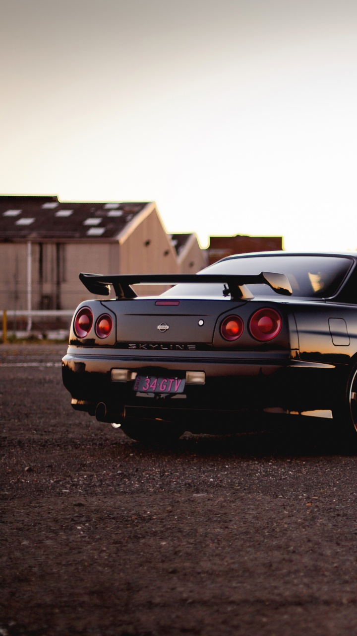 Black Coupe on Road During Daytime. Wallpaper in 720x1280 Resolution