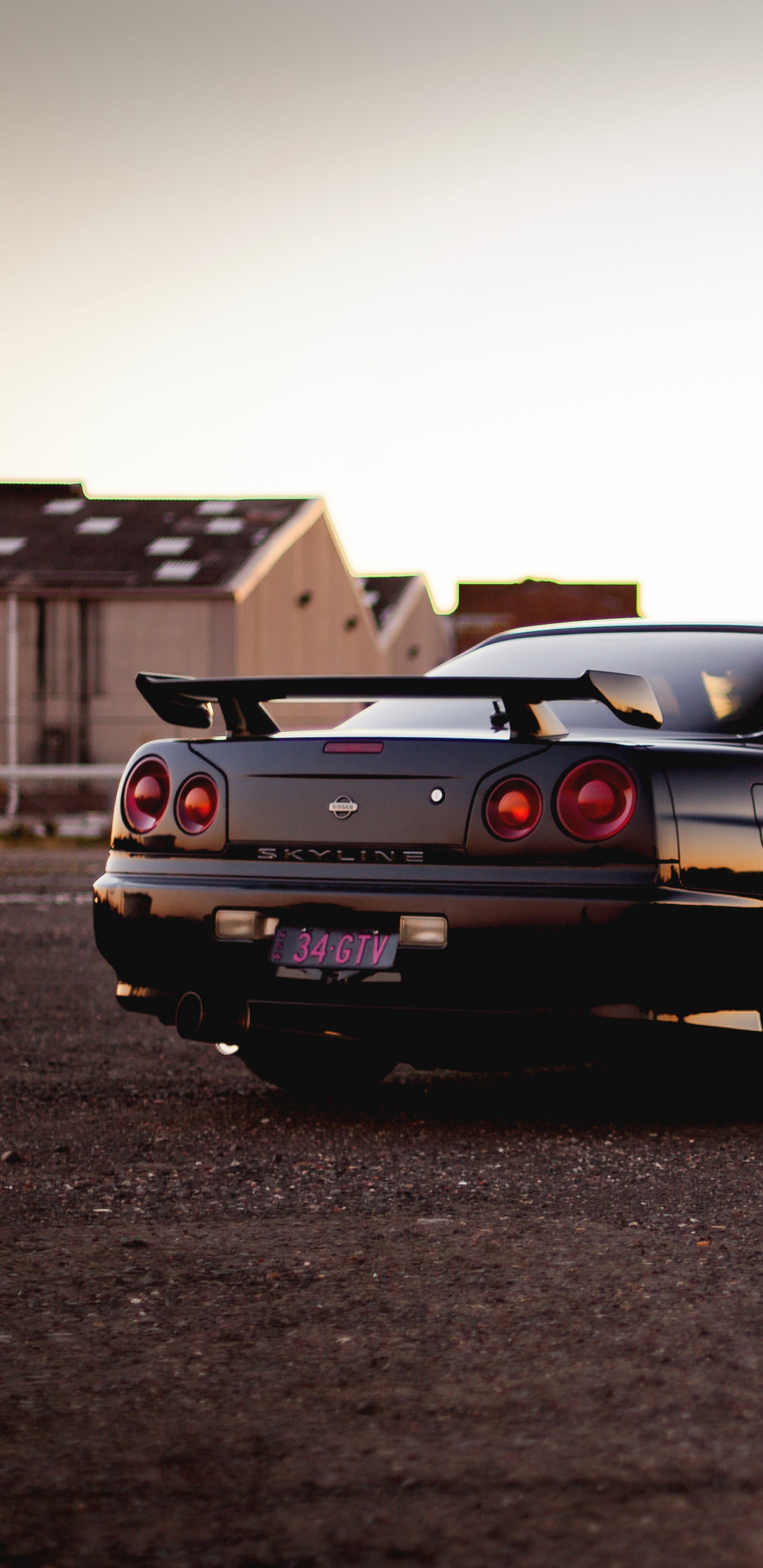 Schwarzes Coupe Tagsüber Unterwegs. Wallpaper in 1440x2960 Resolution