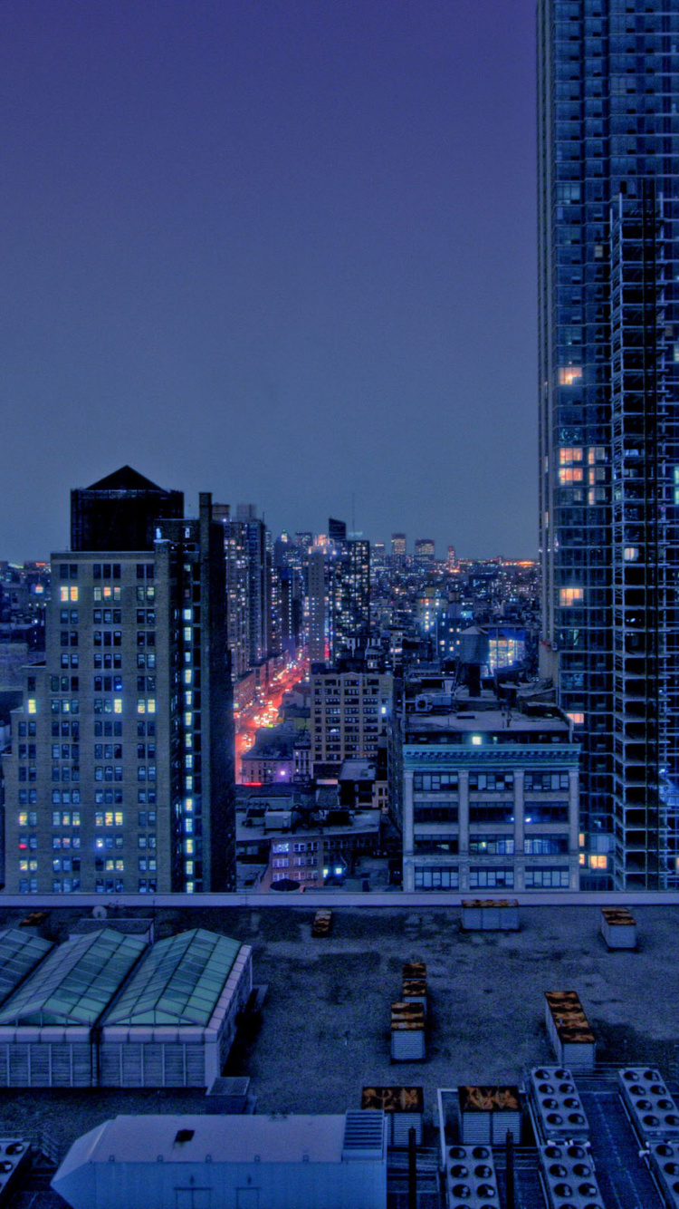 Horizon de la Ville Pendant la Nuit. Wallpaper in 750x1334 Resolution