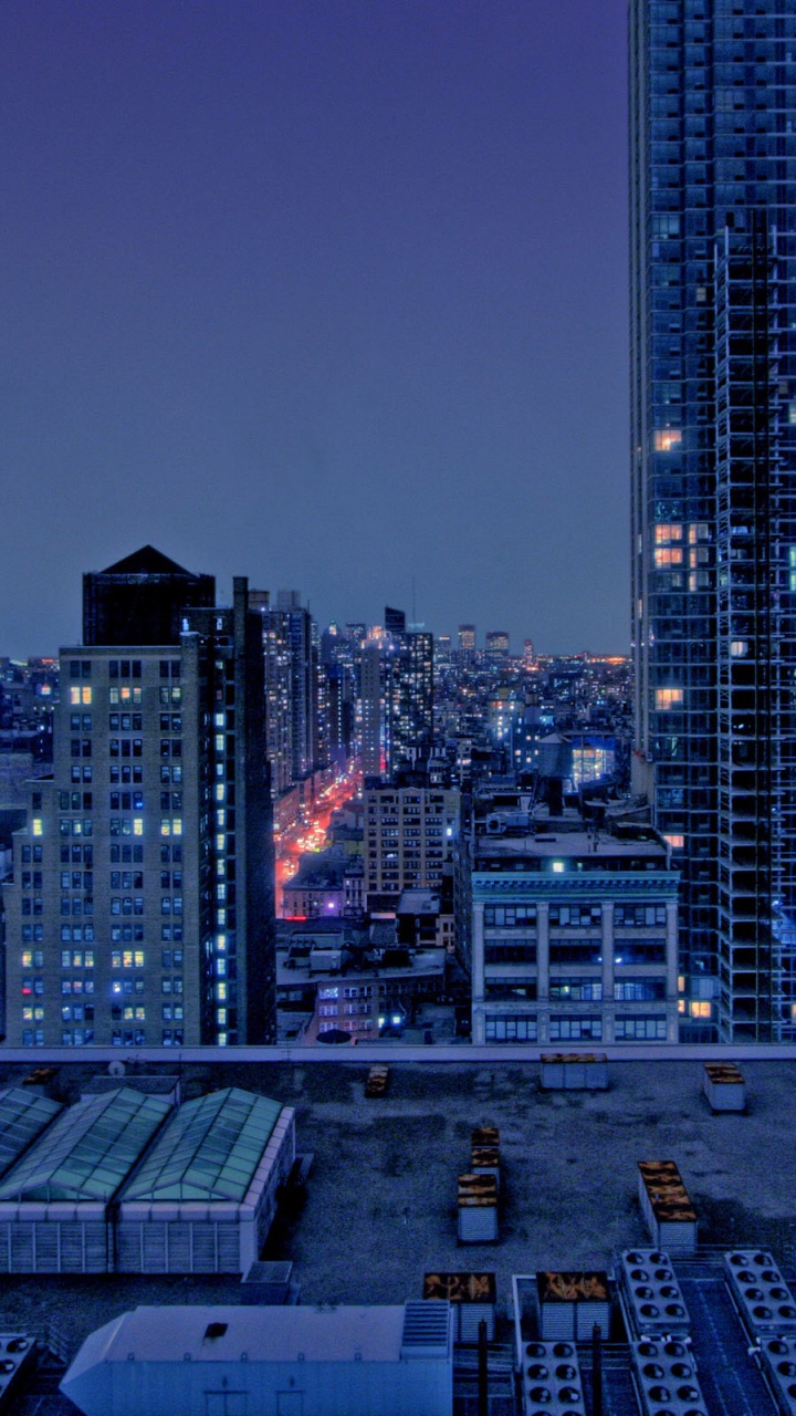 City Skyline During Night Time. Wallpaper in 720x1280 Resolution