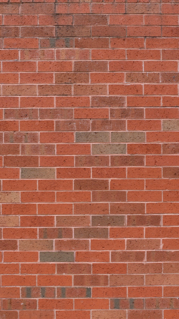 Brown Brick Wall During Daytime. Wallpaper in 750x1334 Resolution