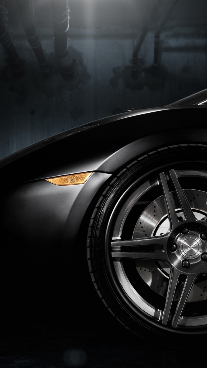 Black and Yellow Car Wheel. Wallpaper in 720x1280 Resolution