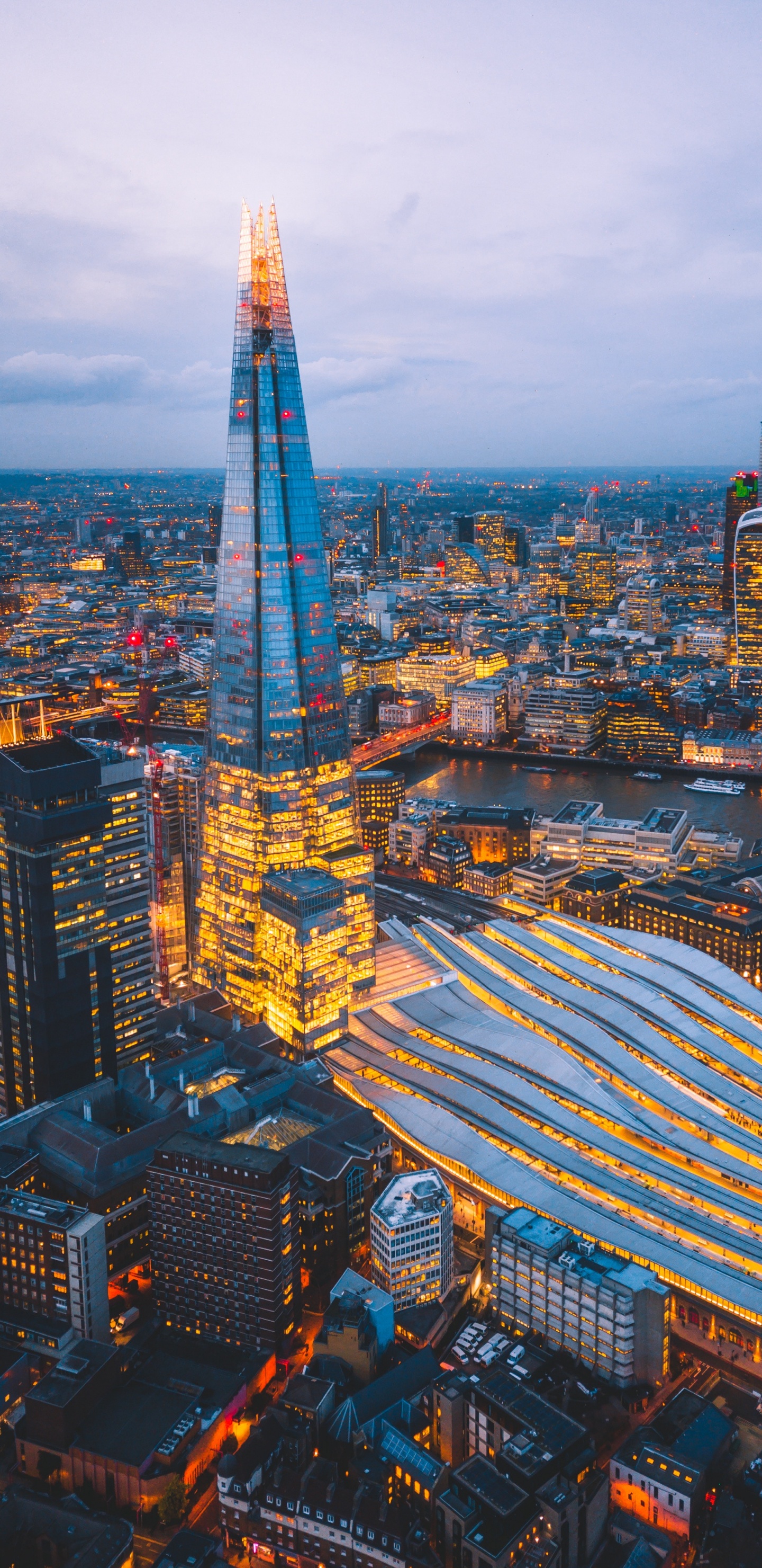 City With High Rise Buildings Under Blue Sky During Daytime. Wallpaper in 1440x2960 Resolution