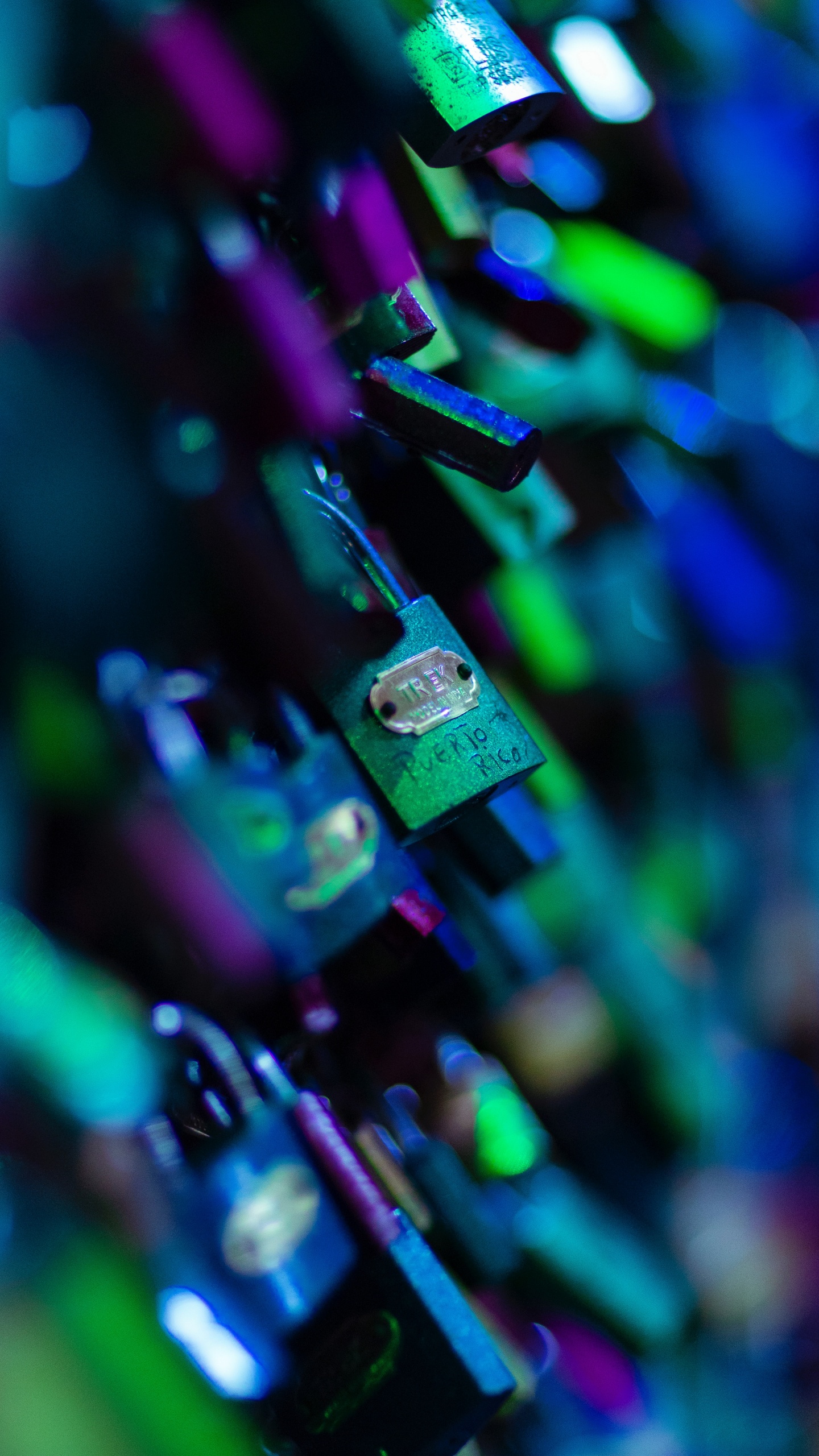 Purple Green and Yellow Padlock. Wallpaper in 1440x2560 Resolution