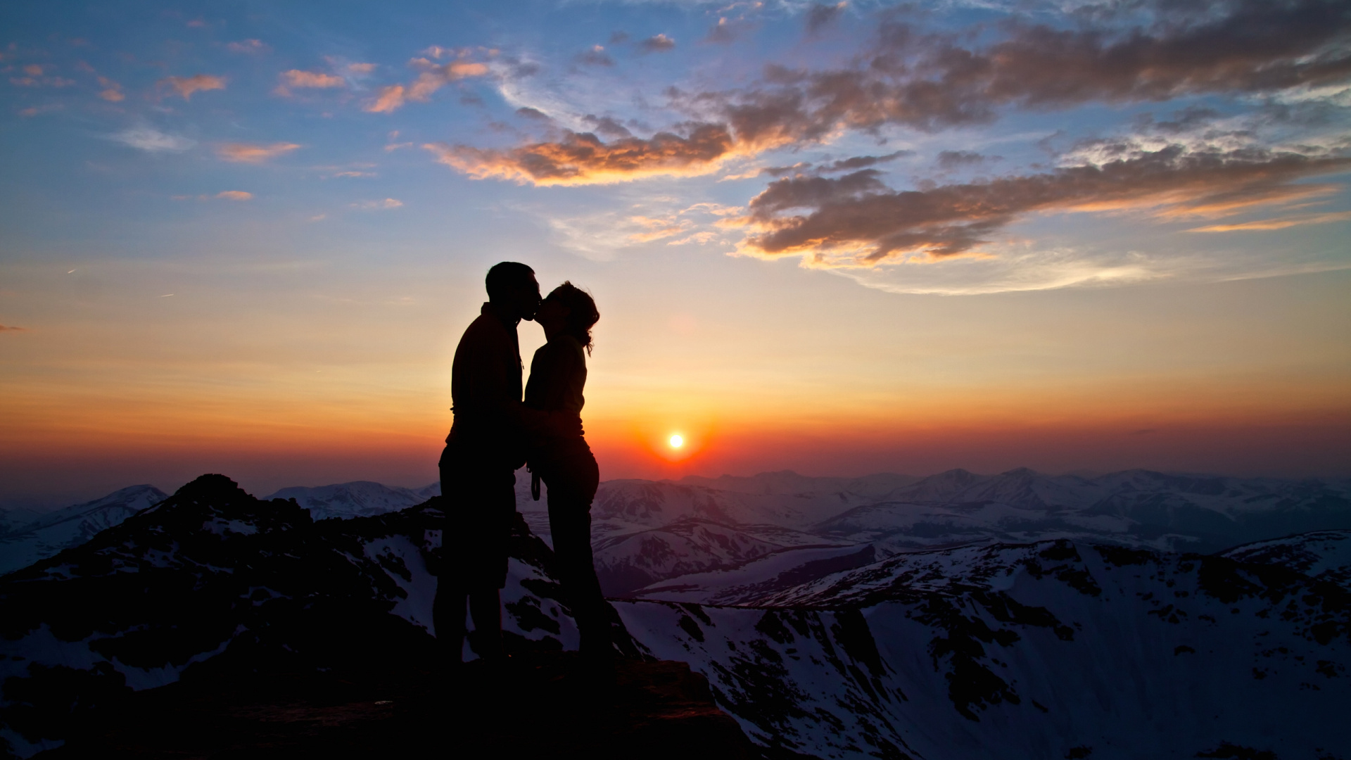 Silhouette of Couple Kissing on Top of Mountain During Sunset. Wallpaper in 1920x1080 Resolution