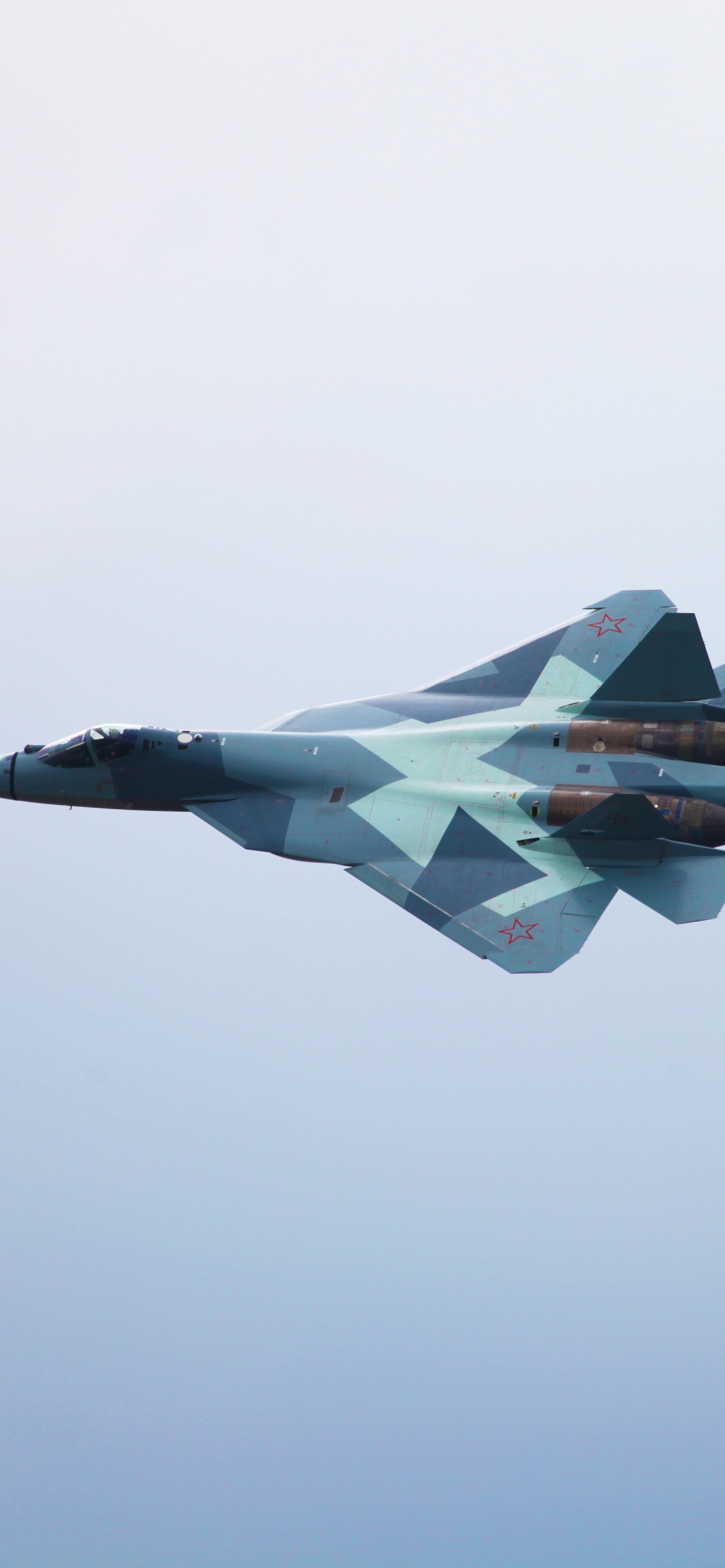 Gray Jet Plane in Mid Air. Wallpaper in 1242x2688 Resolution