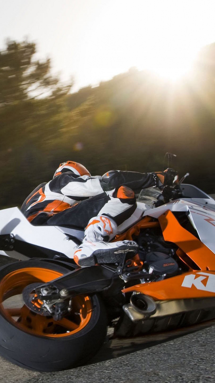 People Riding Sports Bike on Road During Daytime. Wallpaper in 750x1334 Resolution