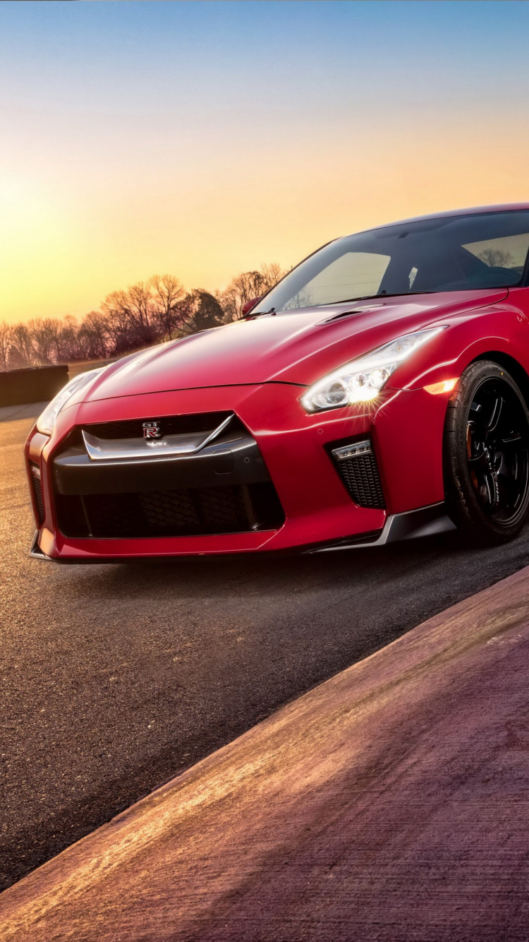 Porsche 911 Rojo en la Carretera Durante el Día. Wallpaper in 750x1334 Resolution