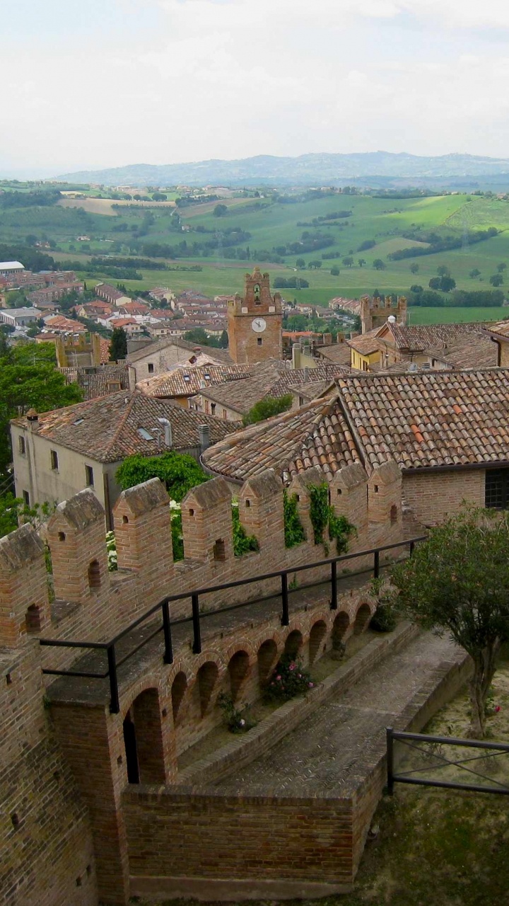 Brown Concrete Building Near Green Trees During Daytime. Wallpaper in 720x1280 Resolution
