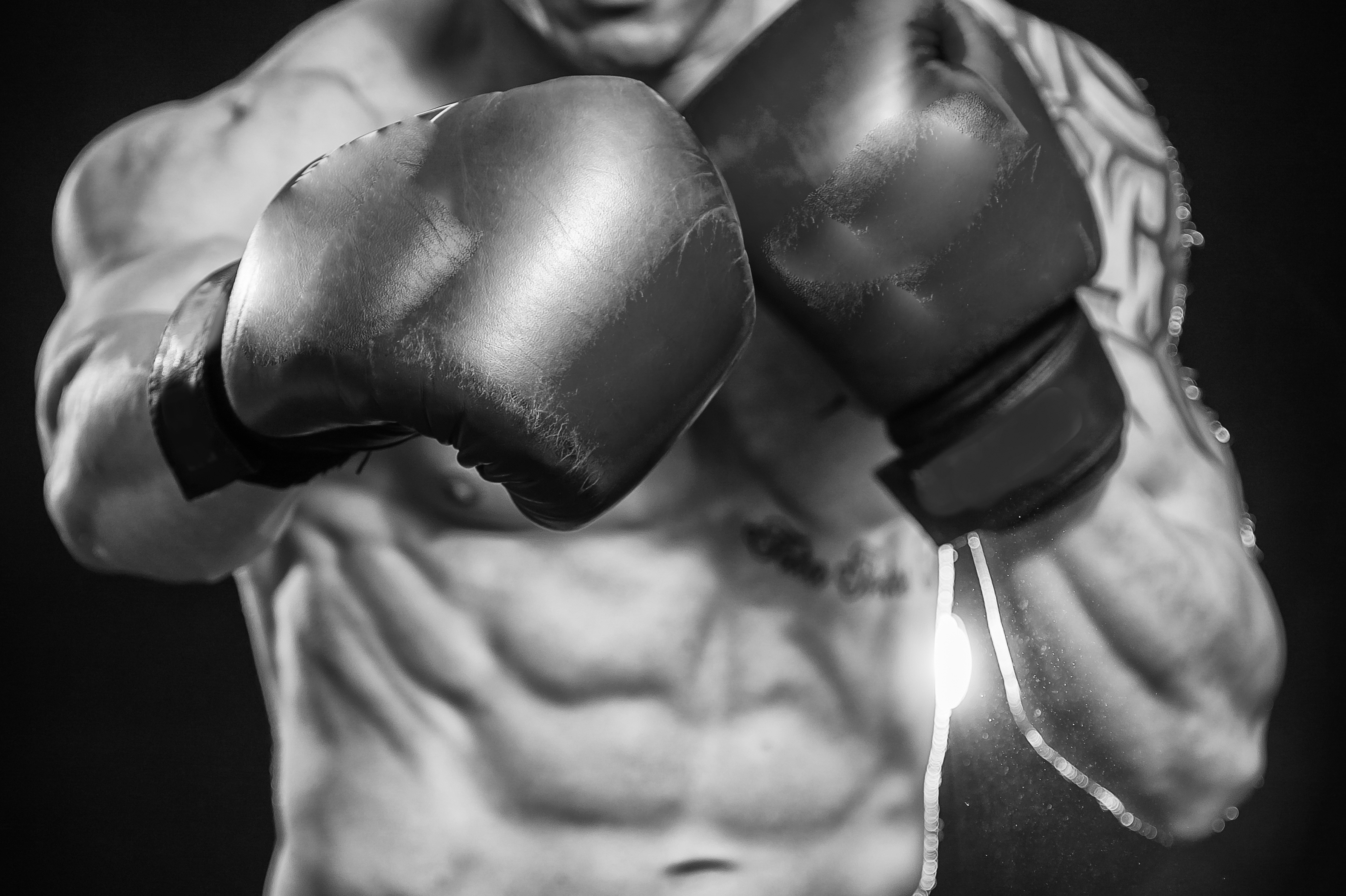 HD wallpaper Boxing Glove hit red and black boxing glove and punching bag   Wallpaper Flare