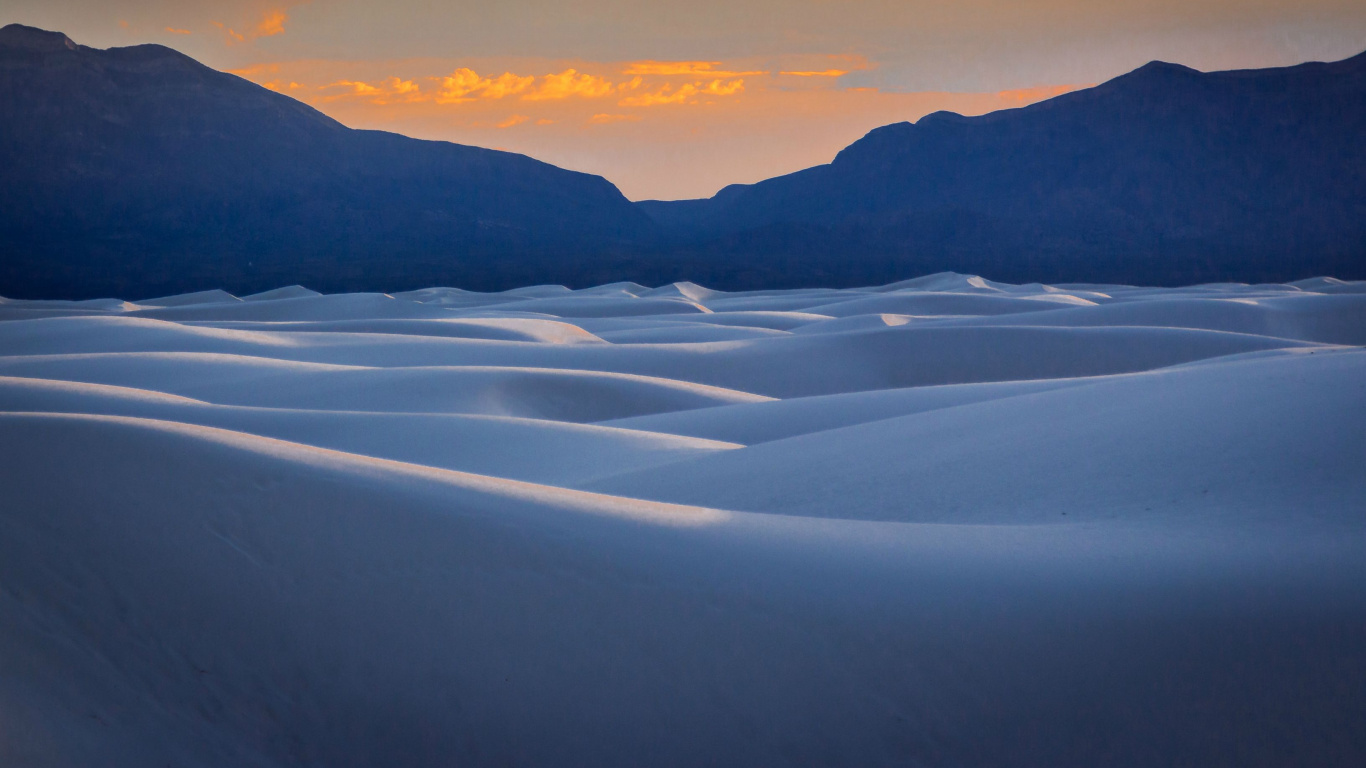 Snow Covered Field Near Mountains During Daytime. Wallpaper in 1366x768 Resolution
